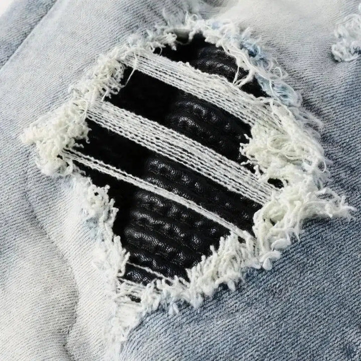 Black-patch whiskered jeans