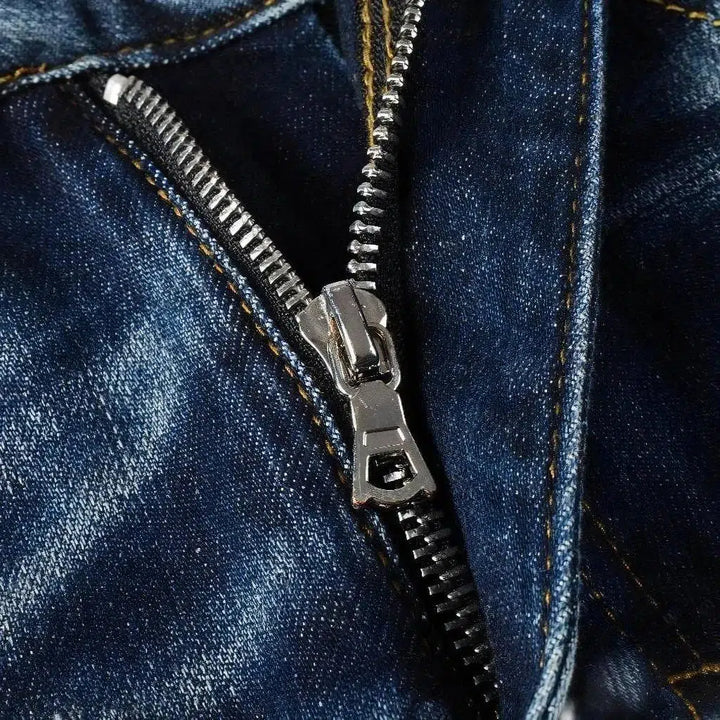 Dark-wash men's grunge jeans