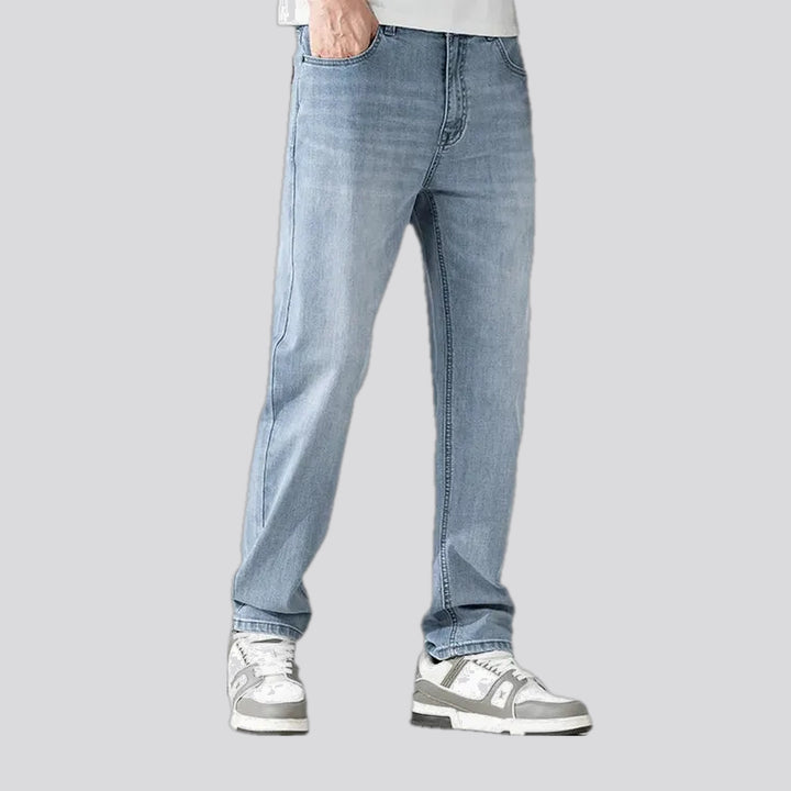 Mid rise light sanded men's jeans