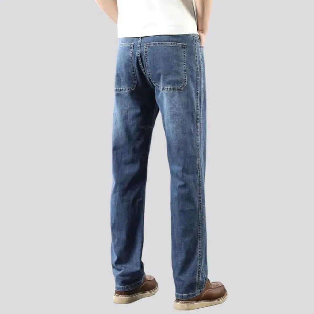 Thin men's whiskered jeans